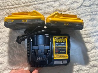2 Dewalt 4.0 powerpack batteries and 4 amp charger