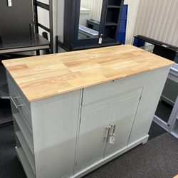 Newly Assembled CHIPPED Sell AS IS Fluted Kitchen Island with Trash Can Storage Cabinet,Power Outlet,Internal Storage Rack,Rolling Kitchen Islands