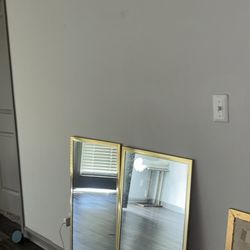 Two Glass gold mirrors
