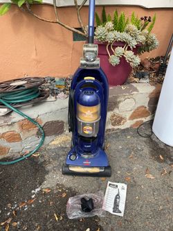Like new Bissell vacuum with full attachment manual Tested Works Perfectly when you come ill fully test it for you