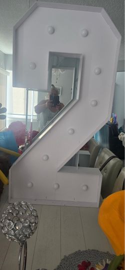 Number 2 sign with light.