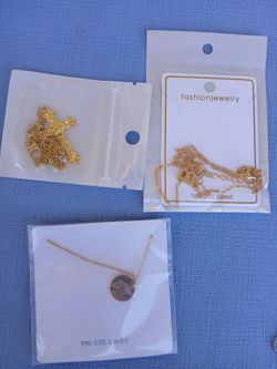 New gold necklaces initial B, unicorn, cross $3 Each