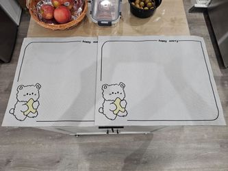 2 New cushioned dinner placemats.