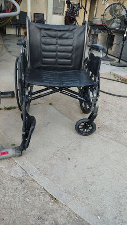 Silla de ruedas capacitada  asta   450 libras