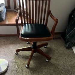 2 Swivel Wooden Chairs That Roll