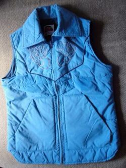 Blue .. Western Vest .. with Silver Braid Design .. Ladies Small.. Miller Outerwear .. Denver, CO. . Fully lined vest