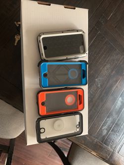 4 iPhone 7 cases. One otter box one pelican marine one light desire and one otter box knockoff