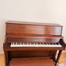Wooden Yamaha piano  
