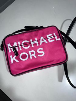 pink michael kors crossbody bag.