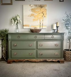 Contemporary sage green long boy dresser with gold and walnut accents