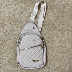 Quilted sling bag with adjustable strap