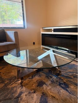 Modern Glass Coffee Table – Sculptural Metal Base