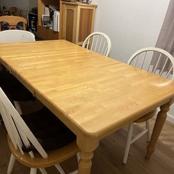 Wooden dining table and 4 chairs