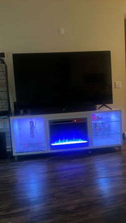 Hisense 65 inch tv with fire pit stand