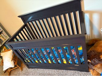 Dark wood crib