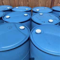 55 Gallon Barrels Food Safe Starting At $10 For Steel $20 For Plastic Clothes. Top Lid Does Not Come Off.