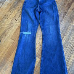 High-waisted Express flare jeans with a distressed look. Size: 2