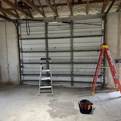 Overhead Garage Door Broken Spring Opener Off Track  Adjustment Replace And Parts 