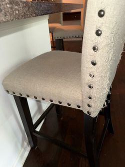 Gray/black studded barstools