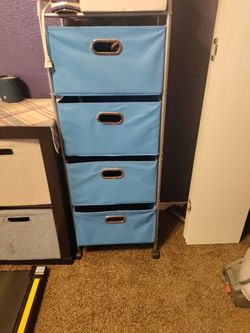 A blue tower dresser 4 drawers