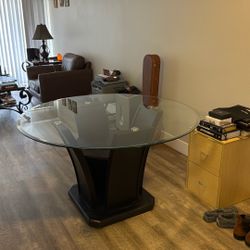 Round Glass Table No Chairs  $225.00