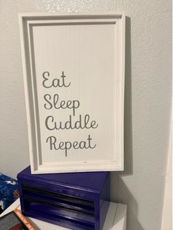 Eat sleep cuddle repeat sign