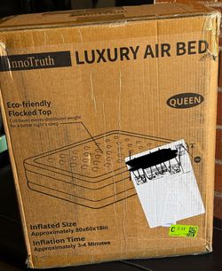 Queen size air mattress *BRAND NEW*