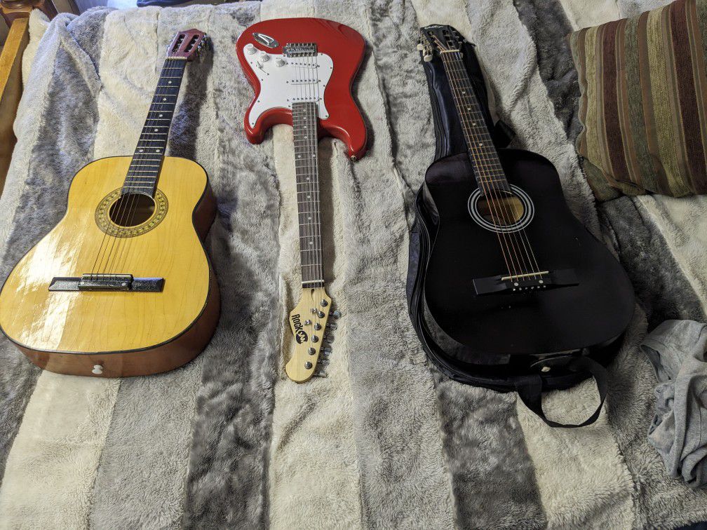 1 Electric/ 2 Acoustic Guitars