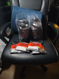 BRAND NEW  WATER JUGS NEVER USED AND COOLING SLEEVES FOR THE SUMMER!