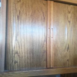 Entertainment center doors open or close. I great condition
