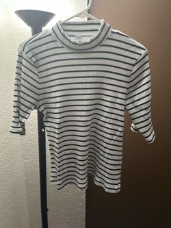 Black and white striped mock neck top
