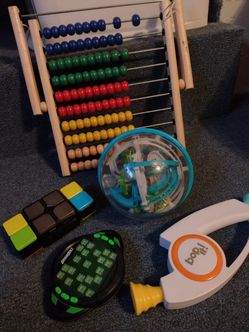 BrainBolt, Flipslide, Bop It, Perplexus Epic 3D Ball, Abacus