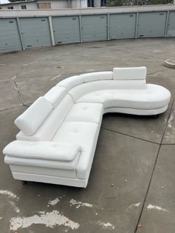 White Leather Curved Sectional Sofa
