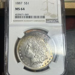 Morgan Silver Dollar 1887 MS64 with Nice, full spectrum rainbow tong crescent