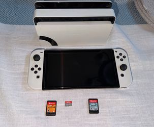Nintendo switch OLED with 2 games & micro SD