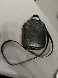 Gucci embossed mini gg crossbody bag