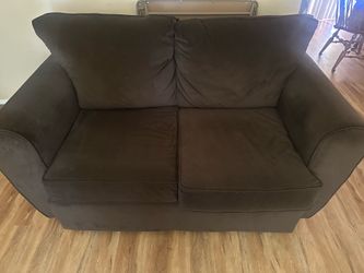 Brown Fabric loveseat pull out bed