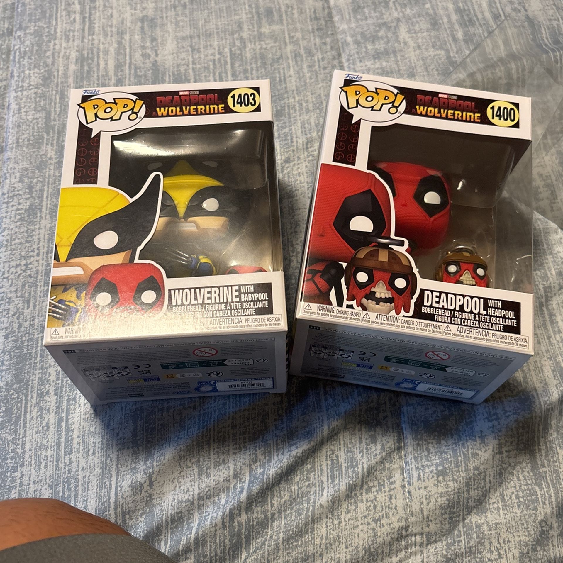 Funko Wolverine With Baby pool and Deadpool With Headpool