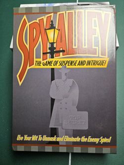 4 Like New Kid-Friendly Board Games - Spy Alley, 5 Minute Mystery, Trivial Pursuit (Family Edition) And Blokus Trigon