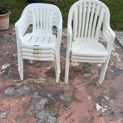 7 Plastic Outdoor Chairs 
