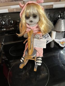 Halloween Creepy Doll On Rocking Horse Thumbnail
