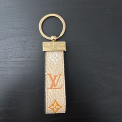 Cream Louis Vuitton Monogram leather keychain with gold hardware