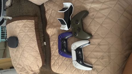 Ps5 controllers and charging station and Xbox controllers