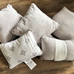5 Decorative grey & off-white pillows