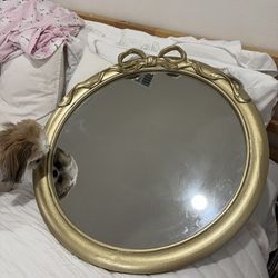 Gold bow mirror