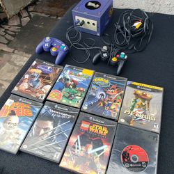 8 Great Games Nintendo GameCube . With 2 Controller. 1 Mic. All cables. & Black Doc 101 or Purple Doc 001 Bundles $320! Firm or all $400! 2 consoles