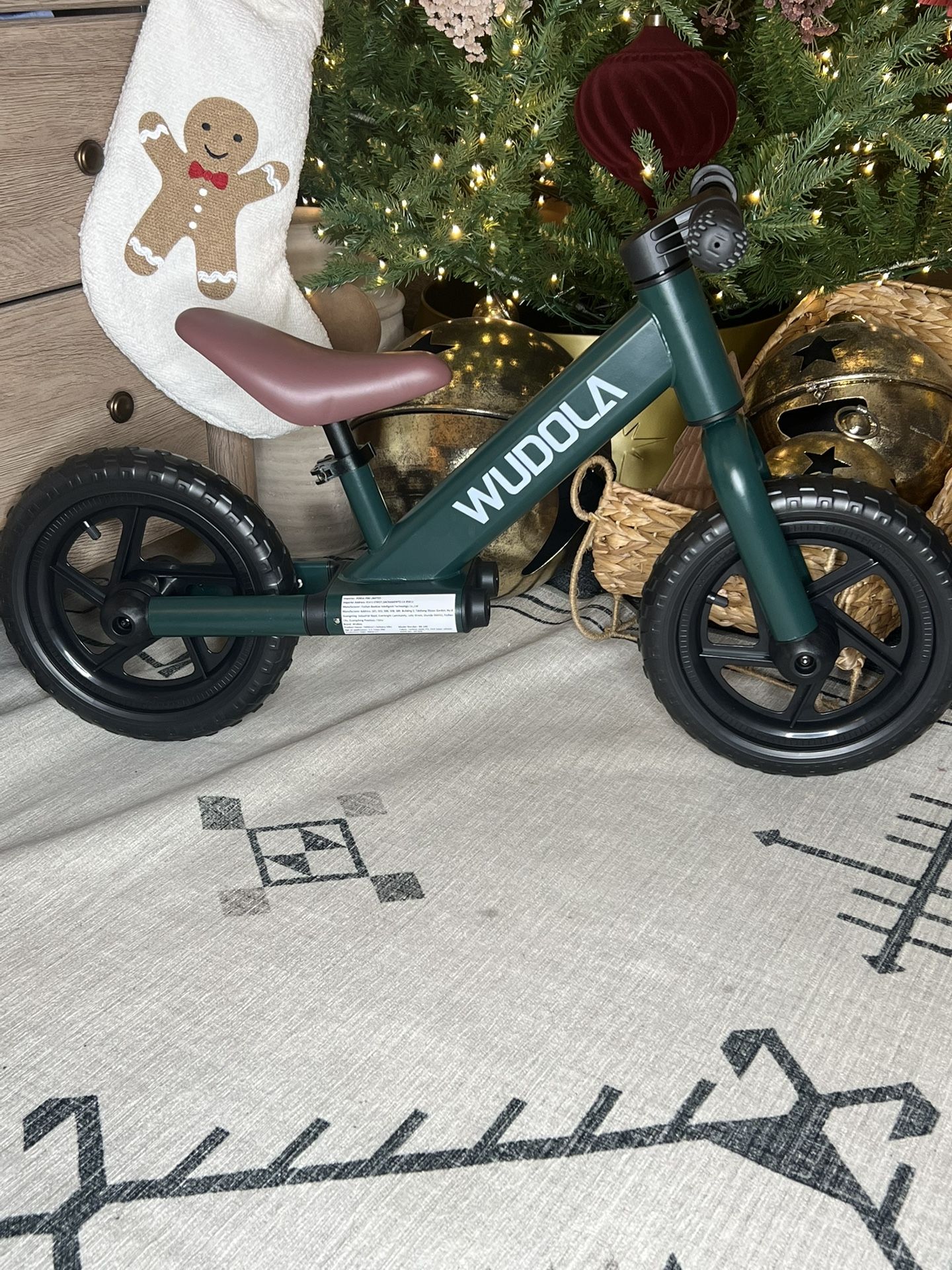 Balance bike for children aged 2 to 5 years, available in dark green and white