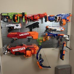 Make offer,  12 Nerf Guns, Bullets And Display Peg Board