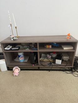 Brown wooden tv stand
