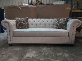 Tufted back and arms sofa and loveseat light beige fabric with gold color crystal and bronze nail heads on arms